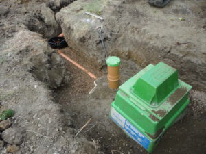 sewage treatment plant with concrete backfill