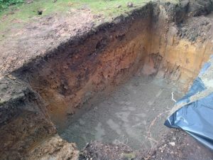 concrete base leveled to sit sewage treatment plant