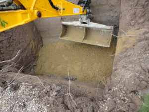 concrete base situated at the bottom of excavation to sit new sewage treatment plant